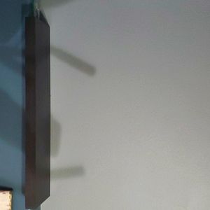 Dark brown floating shelf